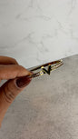 Brazalete V